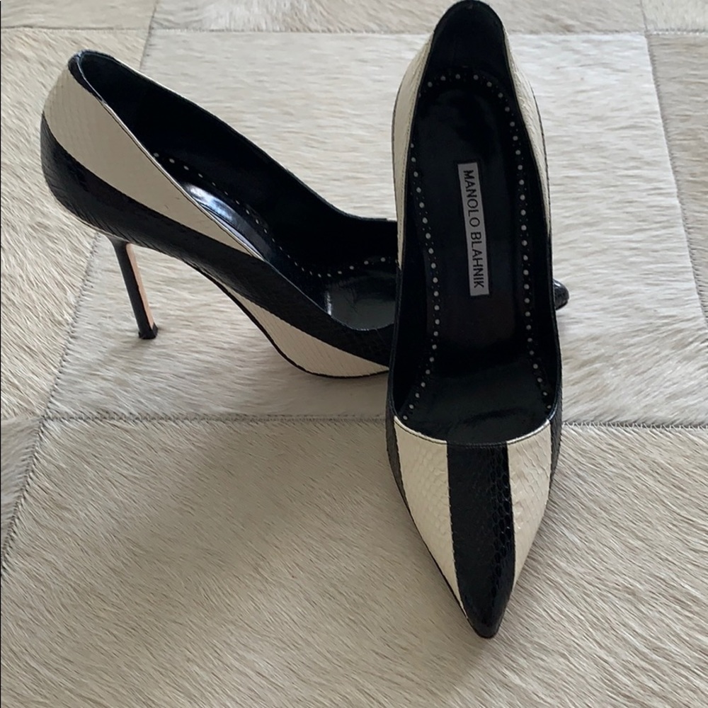 Black and off white python pumps. 35.5 run long.